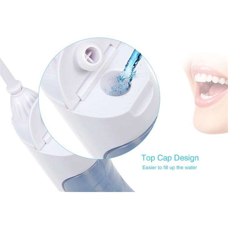 Irrigateur buccal portatif